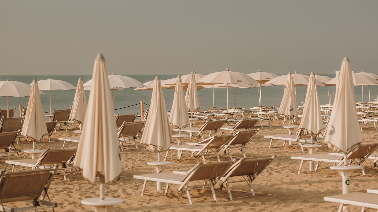 Empty sunbeds on a quiet beach